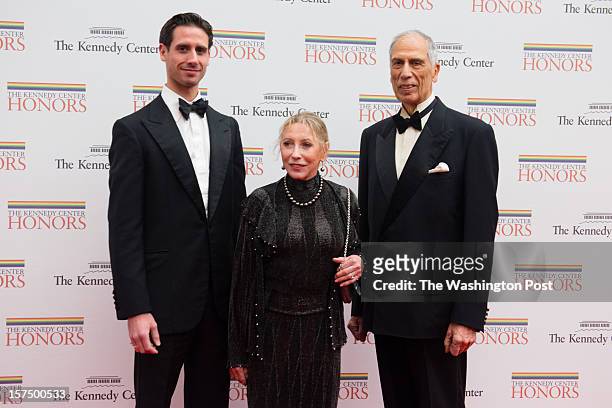 Kennedy Center Honoree, Natalia Makarova, center, is pictured with her son, Andrei Karkar, left and her husband, Edward Karkar as they enter the...