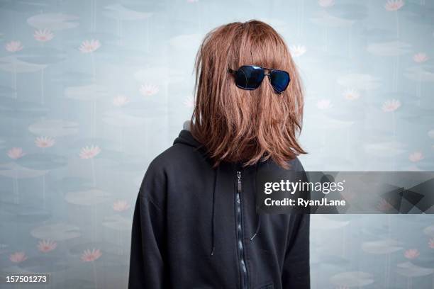 straight hair face - hiding face stock pictures, royalty-free photos & images