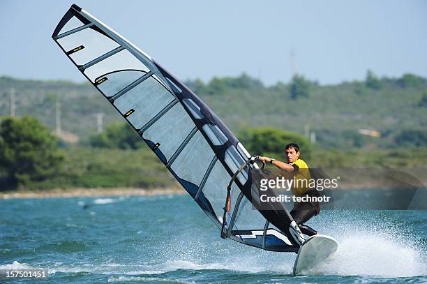 windsurfer racing - wind surfing stock pictures, royalty-free photos & images