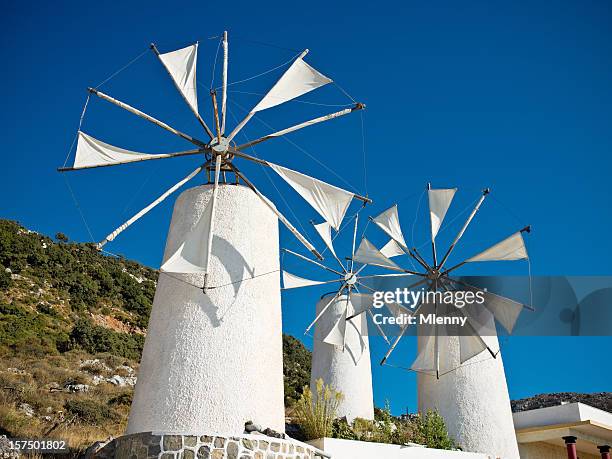 classical greek windmills - herakleion stockfoto's en -beelden