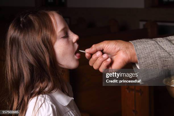 communion - receiving communion stock pictures, royalty-free photos & images