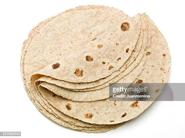 lot of whole wheat flour mexican tortillas - volkorentarwe stockfoto's en -beelden