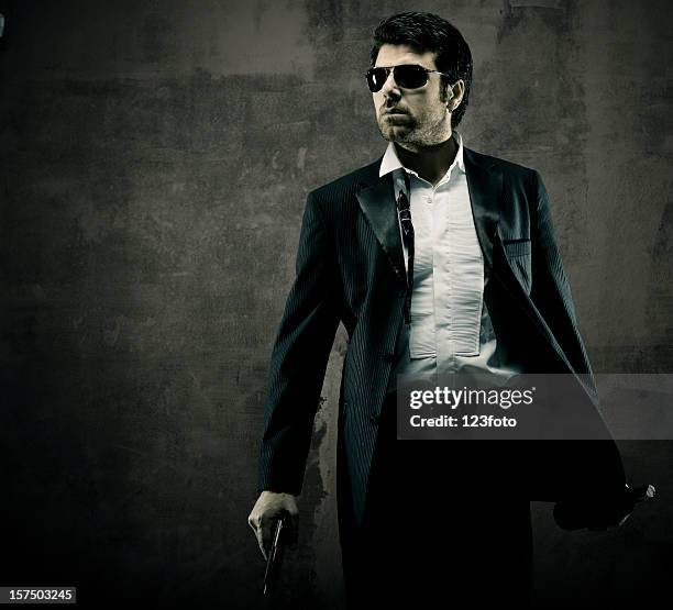 spy - man tuxedo profile stock pictures, royalty-free photos & images