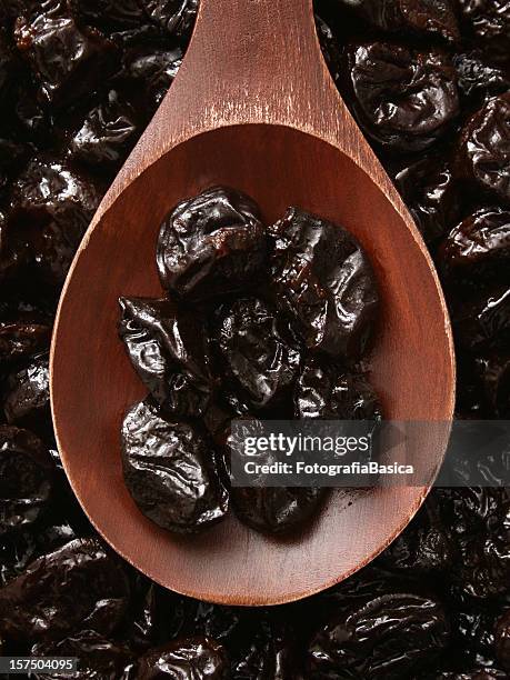 dried plums - dried plum stock pictures, royalty-free photos & images