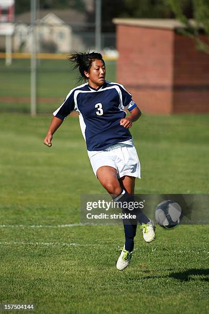 soccer mid-air soft touch - soccer ball bouncing stock pictures, royalty-free photos & images