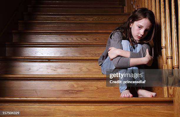 lonely child - abused girl stock pictures, royalty-free photos & images