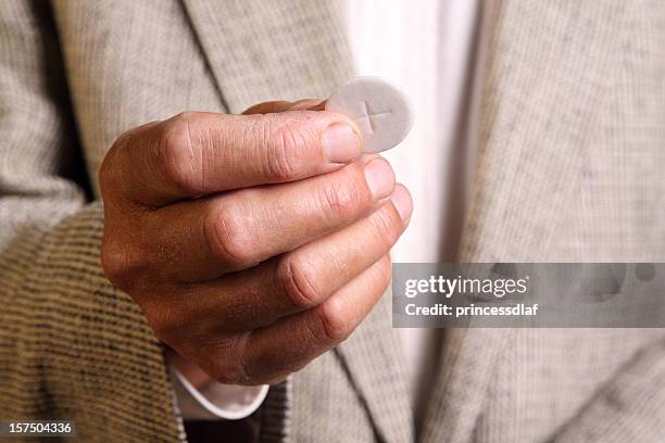 giving communion - communion wafer stock pictures, royalty-free photos & images
