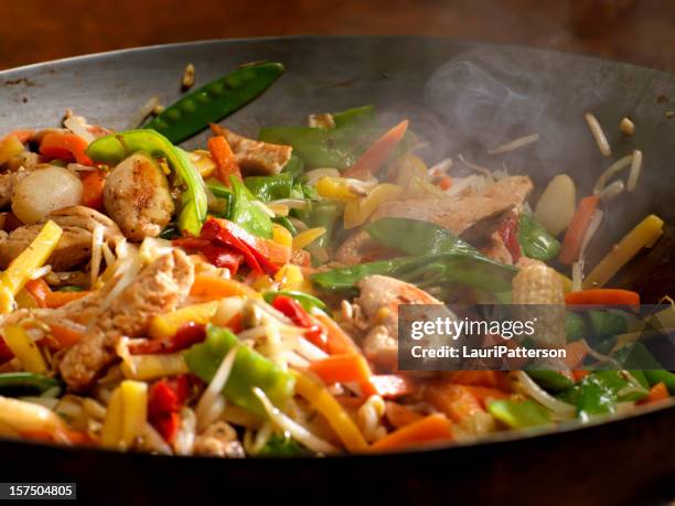 chicken and vegetable stir fry - stir fried stock pictures, royalty-free photos & images