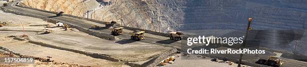 large dump trucks in utah copper mine - mining machinery bildbanksfoton och bilder
