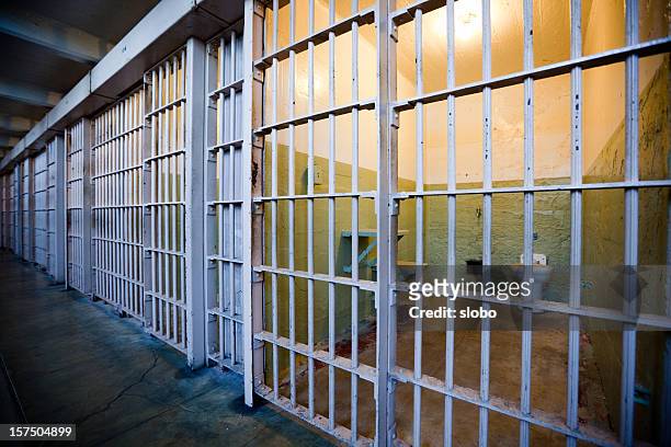 row of prison cells - death sentence stock pictures, royalty-free photos & images