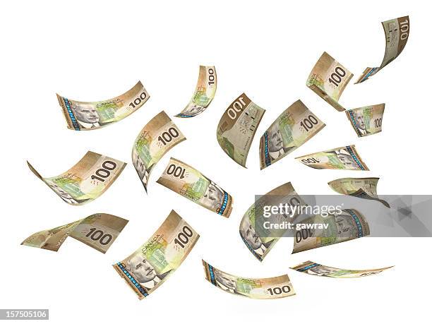 canadian dollar hundred bills in air - canadian money stock pictures, royalty-free photos & images