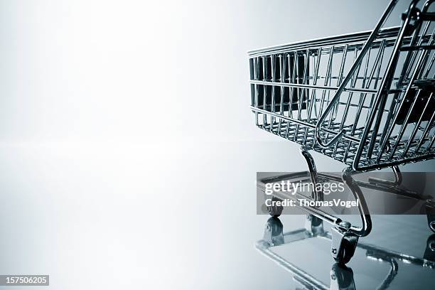 backlit shopping cart. basket business retail e-commerce shop wagon store - shopping trolleys stockfoto's en -beelden