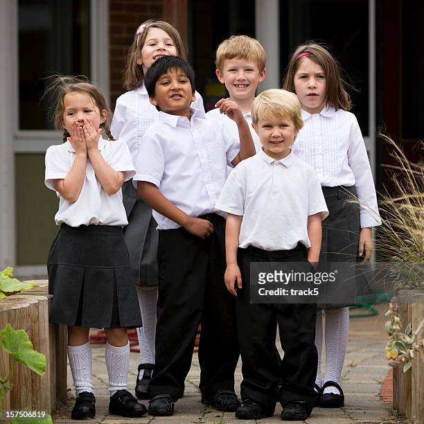 primary school: junior class friends standing together - skolfoto bildbanksfoton och bilder