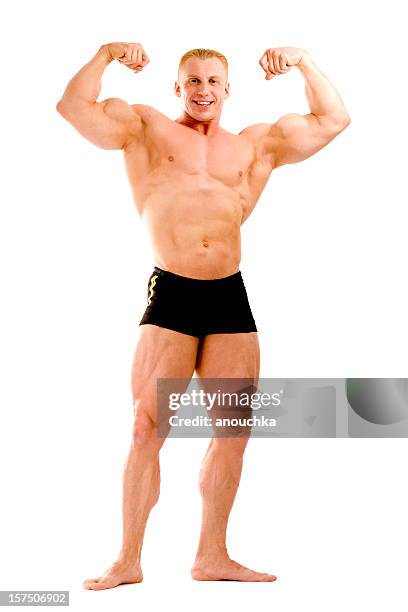 cuerpo builder posando sobre fondo blanco - handsome bodybuilders fotografías e imágenes de stock