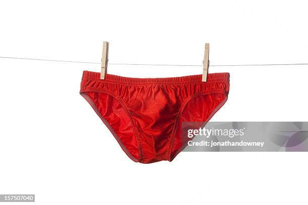 red briefs - clothesline stock pictures, royalty-free photos & images