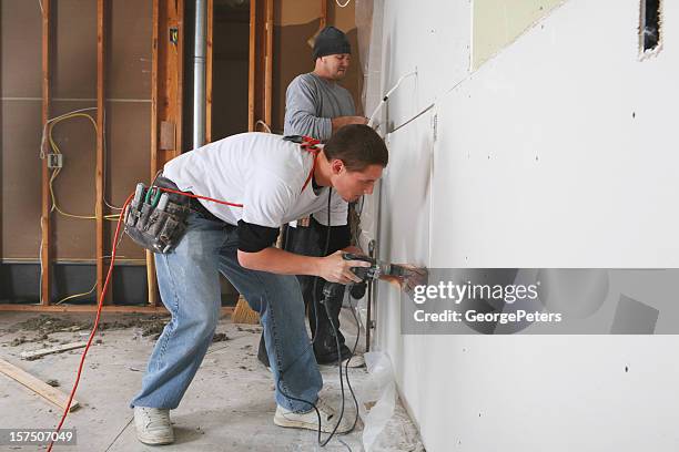 sheetrock hangers - drywall stock pictures, royalty-free photos & images