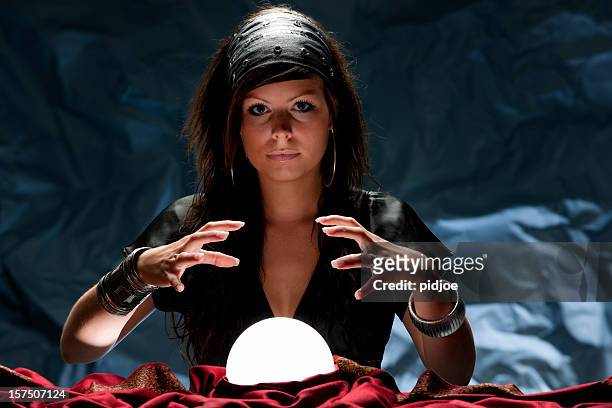 fortune teller with glowing crystal ball xxxl - wizzard stock pictures, royalty-free photos & images