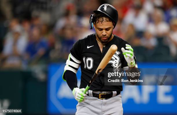 Yoan Moncada of the Chicago White Sox walks to the team dugout after striking out against the Texas Rangers during the second inning at Globe Life...