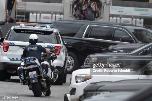 The motorcade carrying former US President Donald Trump arrives at the E. Barrett Prettyman US Court House in Washington, DC, US, on August 3, 2023...