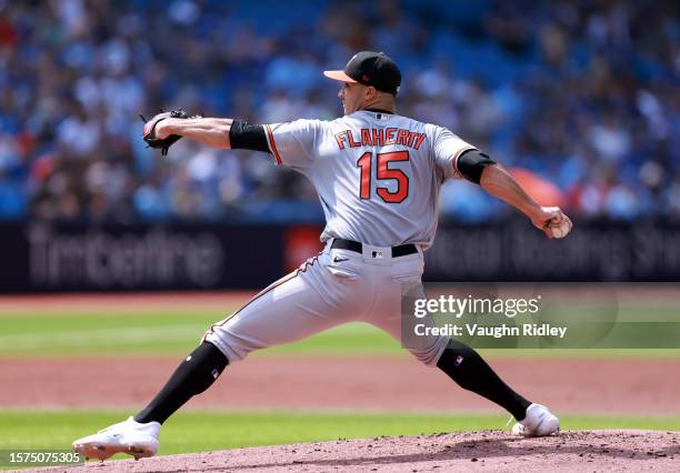 Jack Flaherty of the Baltimore Orioles delivers a pitch in the first inning against the Toronto Blue Jays at Rogers Centre on August 3, 2023 in...