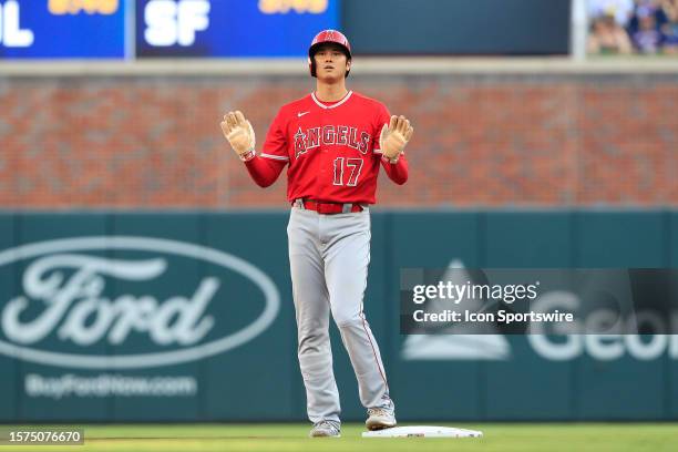 Los Angeles Angels designated hitter Shohei Ohtani gestures during the Monday evening MLB game between the Los Angeles Angels and the Atlanta Braves...