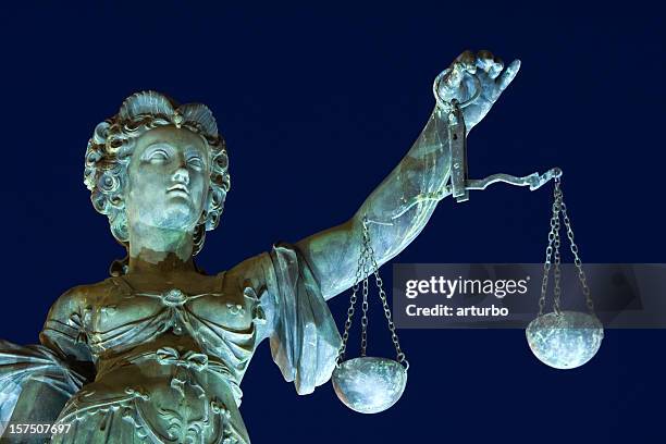 ancient lady justice at night - straff juridik bildbanksfoton och bilder
