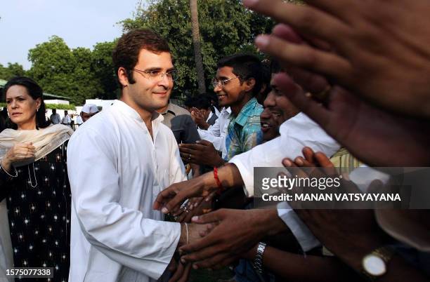 Rahul Gandhi , the newly appointed General Secretary of the All India Congress Committee and son of Congress Party President Sonia Gandhi greets...