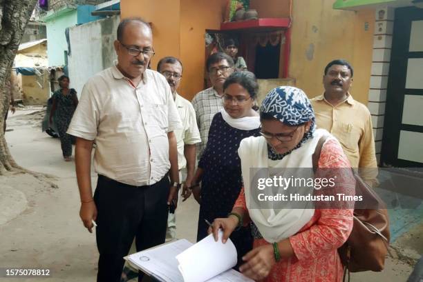 Enumerator staff collect information from residents for a caste-based census in Bihar after Patna High Court rejected a petition against the survey,...