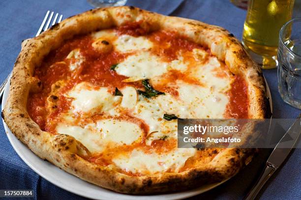 authentic, neapolitan margherita pizza - pizza stock pictures, royalty-free photos & images