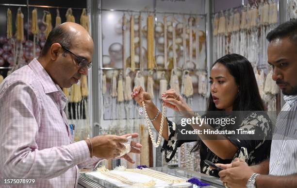 Visitor looks at ornaments on display at the India International Jewellery Show 2023 at BKC, Bandra on August 3, 2023 in Mumbai, India.