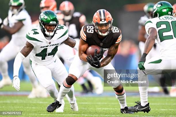 Cedric Tillman of the Cleveland Browns catches a pass against Jamien Sherwood of the New York Jets during the first half of the 2023 Pro Hall of Fame...