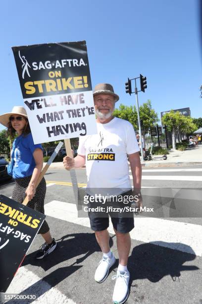 Billy Crystal walks the picket line in front of Paramount Pictures Studios in support of the SAG-AFTRA and WGA strike on August 3, 2023 in Los...