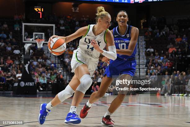 Minnesota Lynx forward Dorka Juhasz dribbles the ball during a WNBA game between the Minnesota Lynx and the Connecticut Sun on August 1 at Mohegan...