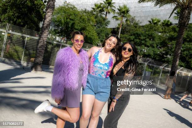 Fashionably dressed Taylor Swift fans Stephanie Austin, 34 of Idaho, left, Sara Ledo of Los Angeles and Alia Douglas of Idaho pose near SoFi Stadium...