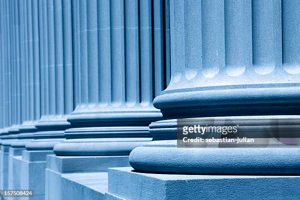 group of corporate blue business columns - financial strength stock pictures, royalty-free photos & images