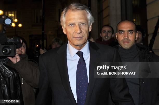 France's former Prime Minister Dominique de Villepin leaves the Paris court financial crimes section on November 25, 2010 in Paris, after a hearing....