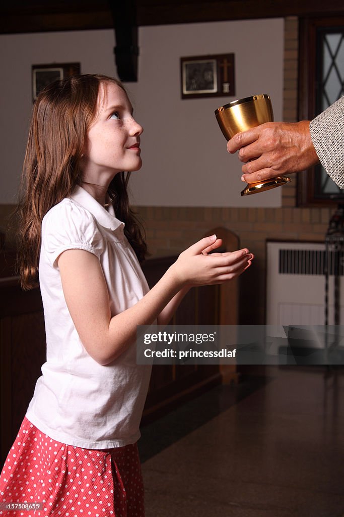 Girl Receiving Holy Communion
