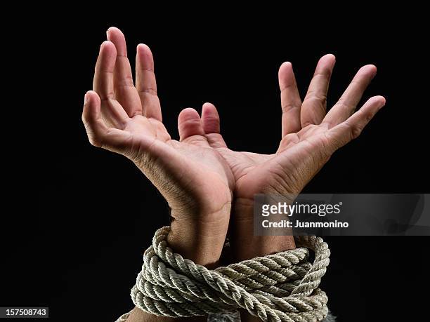 hands tied up - tied up stock pictures, royalty-free photos & images