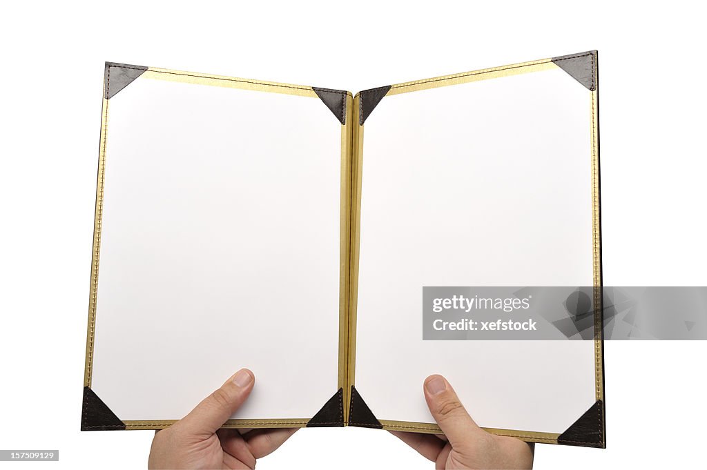 A photo of a menu opened to a empty pages