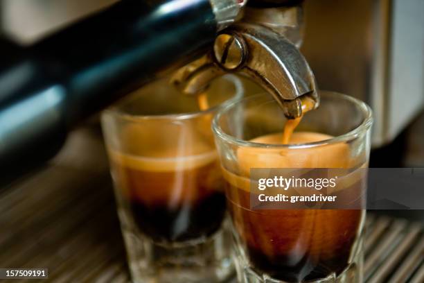 double espresso shot - cafe symmetry stock pictures, royalty-free photos & images