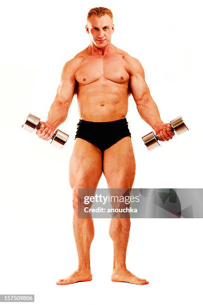 body builder posing on white background - body building stockfoto's en -beelden