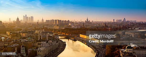spectacular panorama of moscow city with golden river at sunset - moscow stock pictures, royalty-free photos & images