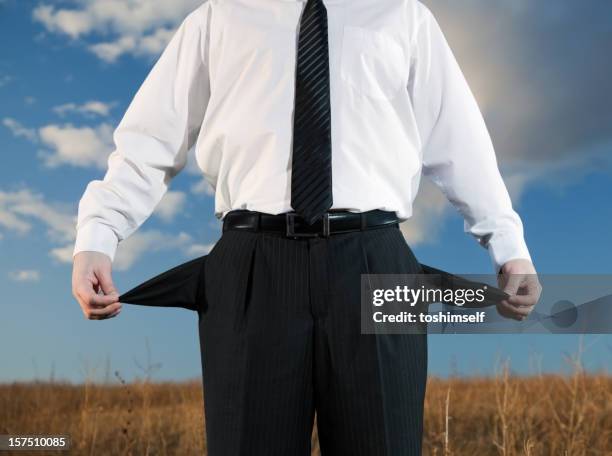 bankrupt - businessman hands in pockets stock pictures, royalty-free photos & images