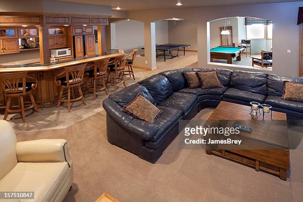 excellent finished basement bar, lounge, game room, pool table, sofa - basement stock pictures, royalty-free photos & images