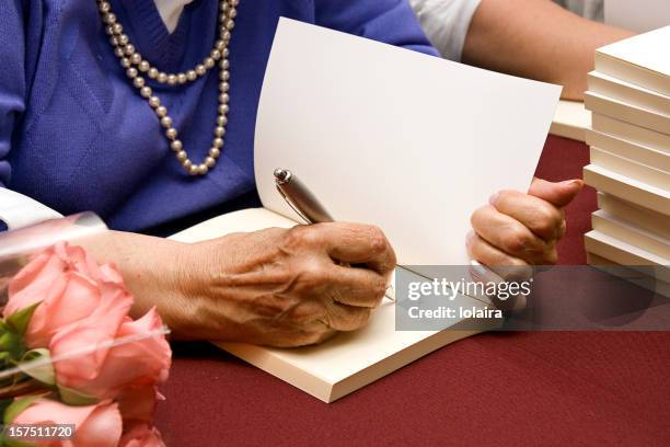 autograph - author signing stock pictures, royalty-free photos & images