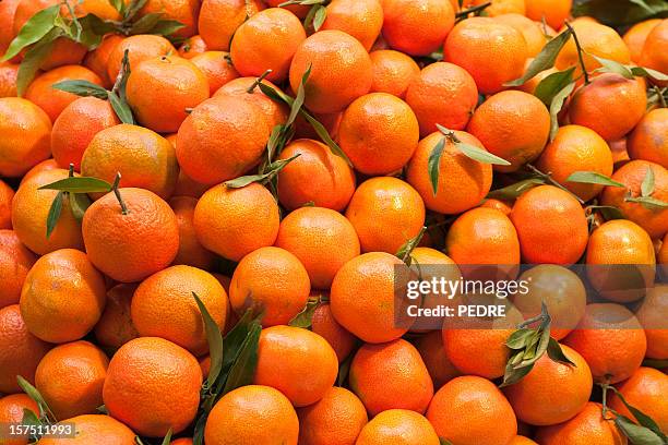 tangerines - mandarijn stockfoto's en -beelden