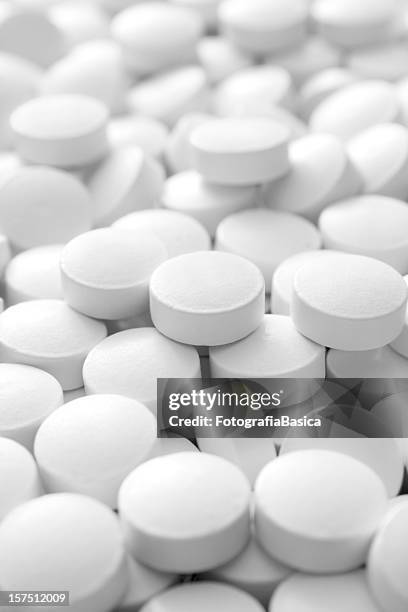 white pills - mdma stock pictures, royalty-free photos & images