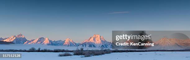 snowy teton mountain range at sunset - grand teton national park sunset stock pictures, royalty-free photos & images