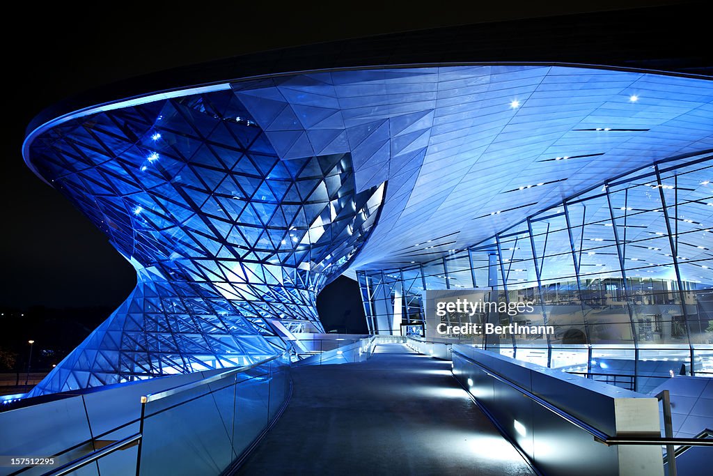 Modern architecture with blue lights at night