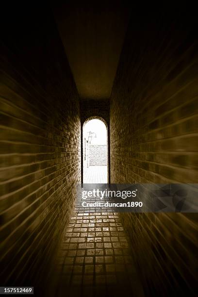 dark passage - black alley stock pictures, royalty-free photos & images